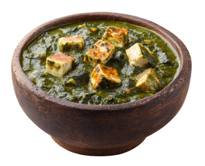 Bowl of vibrant green spinach curry with cubed, browned paneer cheese