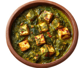 A bowl of creamy, green paneer curry.  Chunks of paneer, a mild Indian cheese, are nestled in a rich, spinach-based sauce.  A top-down view