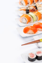 Assorted sushi and maki rolls beautifully arranged on plates