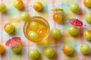 Bright Yellow Fruit and Cocktail with Colorful Umbrellas on Checkered Cloth
