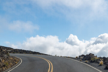 Mountain road above the clouds with scenic views