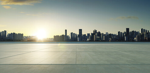 Panoramic skyline and buildings with empty concrete square floor