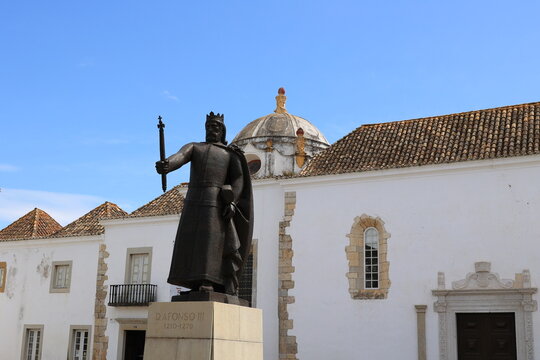Bronze figure of King Afonso III statue in the Portuguese city of Faro  