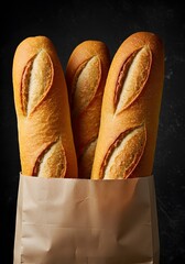 Three baguettes in brown paper bag