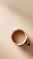 Minimal top view of a beige ceramic cup filled with coffee placed on soft pastel background perfect for branding mockups, calm morning visuals and minimal aesthetic compositions