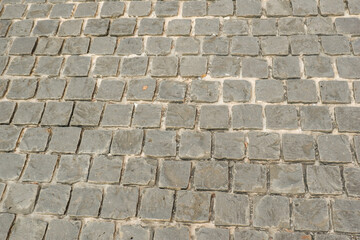 Paving stones on floor in parking lot,Concept of laying paving slabs and pavers,Textured concrete for gray floors,Concrete pavement blocks,space for text.