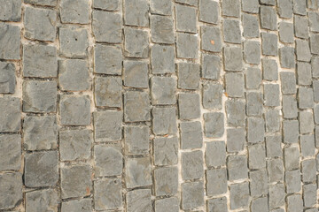 Paving stones on floor in parking lot,Concept of laying paving slabs and pavers,Textured concrete for gray floors,Concrete pavement blocks,space for text.
