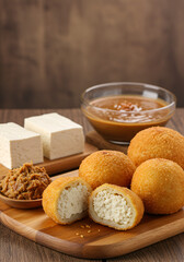 Fried tofu balls and blocks with dipping sauce