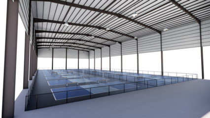 Indoor Pickleball Courts Inside Large Metal Warehouse Structure with Blue and Grey Surface