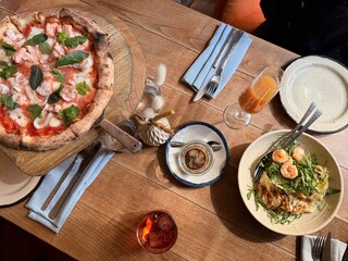 Italian Lunch with Pizza, Salad and Aperitif in Sunlit Setting
