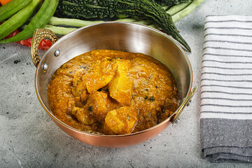 Spicy chicken masala in the bowl