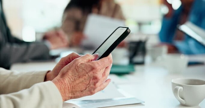 Hands, phone and businesswoman typing in meeting, chat and networking in insurance office. Mobile, texting and employee with team for message online, distraction or check email for claims with app