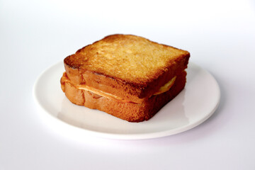 French toast baked to perfection. white background.