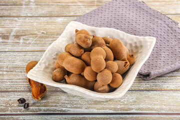 Tropical exotic Tamarind fruit heap