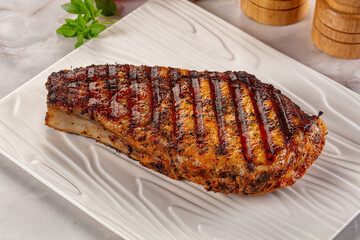 Grilled pork steak with bone