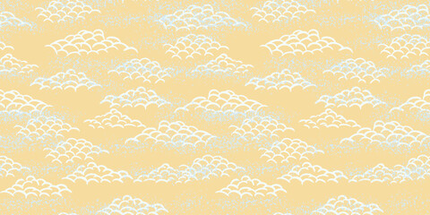 Seamless vector pattern with stylized hand drawn clouds in an Asian inspired design. White curved line clouds on a soft yellow background with a subtle textured effect. Ideal for textiles, wallpaper