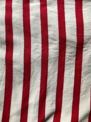 red and white striped background fabric texture 