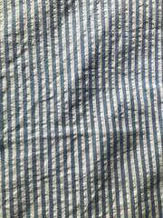 abstract background with blue stripes fabric texture 