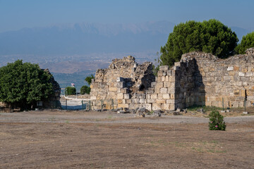 Explore the Historical Ruins of Pamukkale Amidst Serene Landscapes on a Clear Day
