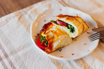 Appetizing Savory Crepe With Fresh Vegetables and Cheese Filling