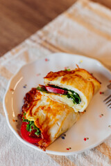 Appetizing Savory Crepe With Fresh Vegetables and Cheese Filling