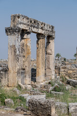 Fototapeta premium Remarkable Ancient Columns Stand in Pamukkale, Revealing the Rich History of This UNESCO World Heritage Site in Turkey