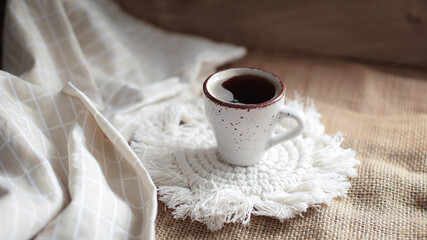 cup of coffee on a simple background, cozy home, notebook and coffee, coffee beans, flatlay, background