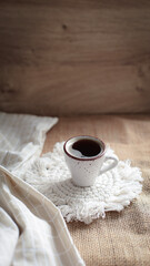 cup of coffee on a simple background, cozy home, notebook and coffee, coffee beans, flatlay, background