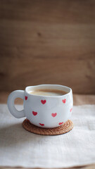 cup of coffee on a simple background, cozy home, notebook and coffee, coffee beans, flatlay, background