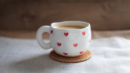 cup of coffee on a simple background, cozy home, notebook and coffee, coffee beans, flatlay, background