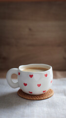 cup of coffee on a simple background, cozy home, notebook and coffee, coffee beans, flatlay, background