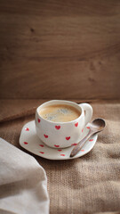 cup of coffee on a simple background, cozy home, notebook and coffee, coffee beans, flatlay, background
