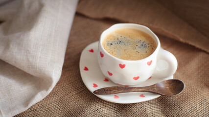 cup of coffee on a simple background, cozy home, notebook and coffee, coffee beans, flatlay, background