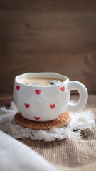 cup of coffee on a simple background, cozy home, notebook and coffee, coffee beans, flatlay, background