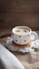 cup of coffee on a simple background, cozy home, notebook and coffee, coffee beans, flatlay, background