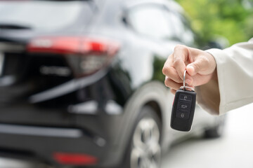 lease, rental car, sell, buy. Dealership manager send car keys to the new owner.  Sales, loan credit financial, rent vehicle, insurance,  renting, Seller, dealer, installment, car care business
