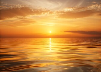 Fototapeta premium Golden sun setting over calm ocean waves in a serene horizon.