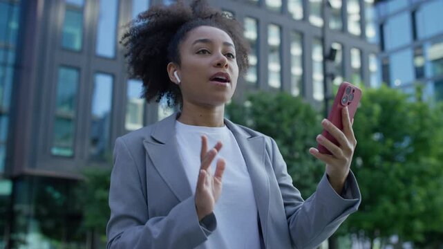 Businesswoman on video call during city commute
