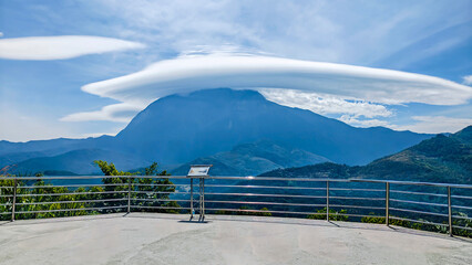 Stunning lenticular cloud formation over Mount Kinabalu, Sabah, Malaysia. A rare weather phenomenon captured above Borneoâ€™s highest peak.