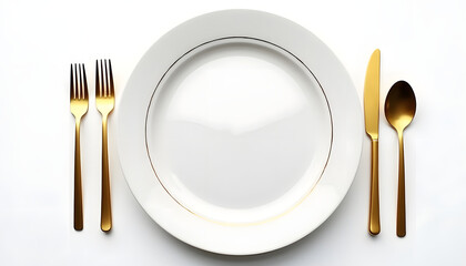 Golden cutlery elegantly arranged alongside a white plate on a clean white surface.