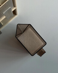 Top view of sugar-filled brown container.