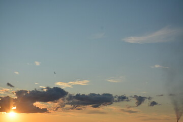 Sunset on a gray-blue sky. Background