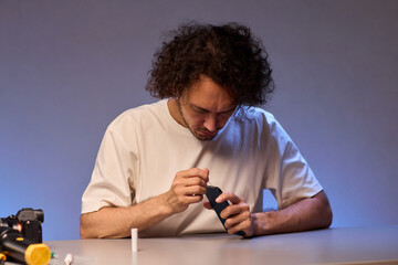 The Innovative Smartphone Cleaning Device is Being Demonstrated During Use and Functionality