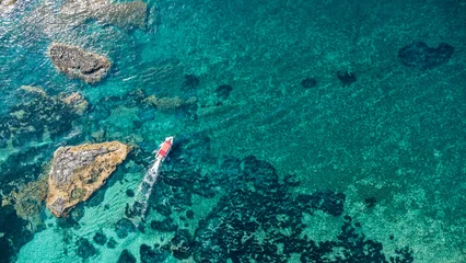 Gordijnen Mediterraans Europa Red-Roof Boat, Coral Reef, and Rocky Outcrop – Aerial View of Mediterranean Coastline in Calabria, Italy  © Marcin