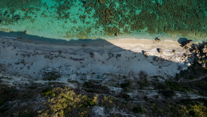 Turquoise Waters, Rocky Shoreline, and Submerged Formations – Aerial View of Mediterranean Coast in Calabria, Italy