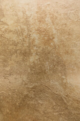 Neutral textured surface displays subtle patterns in warm beige tones, perfect for various design applications and backgrounds