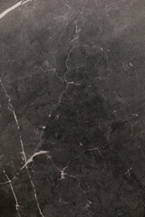 Beautiful textured black marble with white veins showcasing natural elegance and sophistication