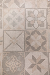 Decorative patterned tiles displaying intricate designs and colors in a contemporary interior setting