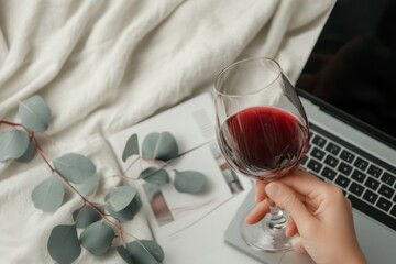 Computer, flower, glass of red wine or drink. Generative AI