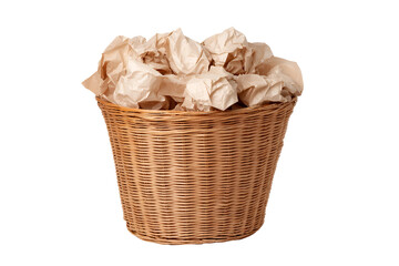 Wicker basket full of crumpled brown paper trash